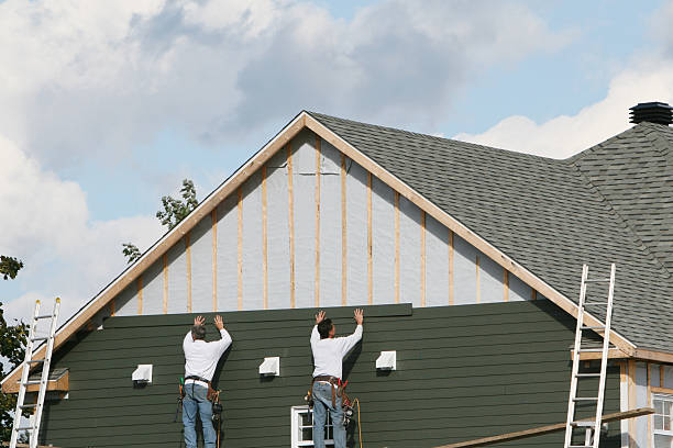 Professional Emergency Siding Repair technician working in Union City, NJ